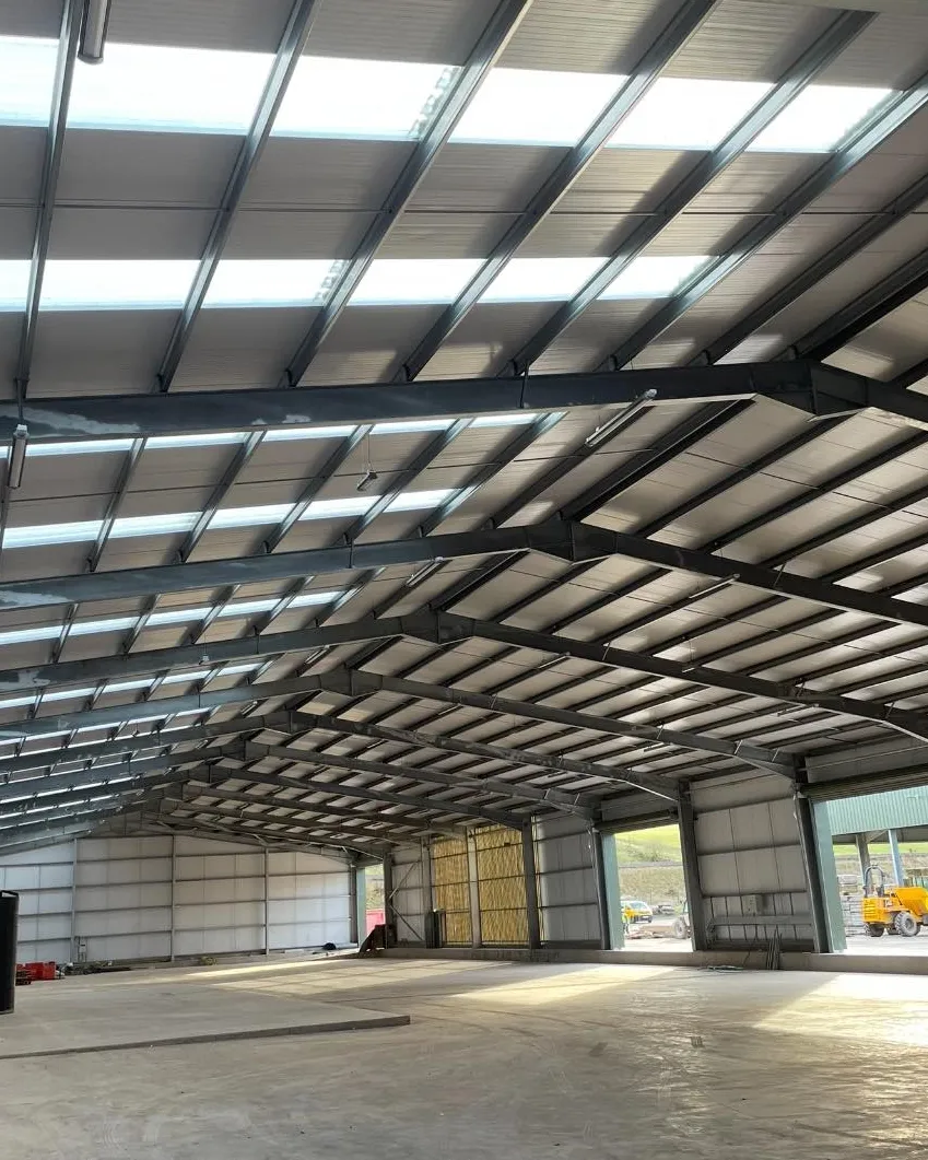 R Hollis team working on a commercial steel building site